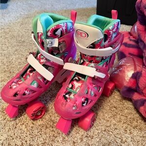 Pink and White Roller Derby Skates